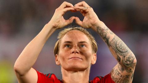 Wales midfielder Jess Fishlock makes a love heart gesture