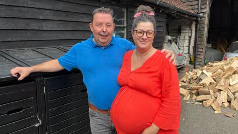 Lucy Wells and her partner Steve Clifford at their farm in Marden