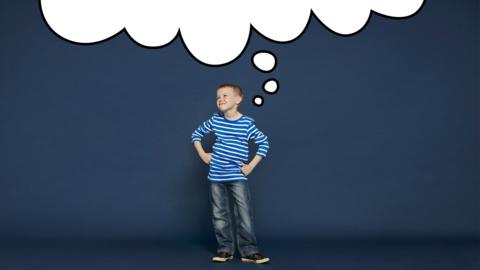 A young boy standing against a blue wall and looking thoughtful. An illustrated thought bubble is pointing to his head.