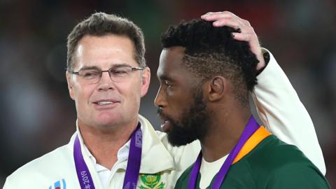 Rassie Erasmus and Siya Kolisi pictured at last year's World Cup 