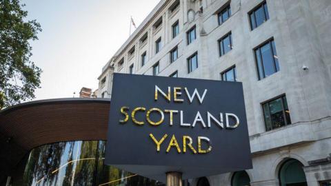 New Scotland Yard sign outside the Met Police HQ