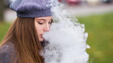 Vaping teenage girl