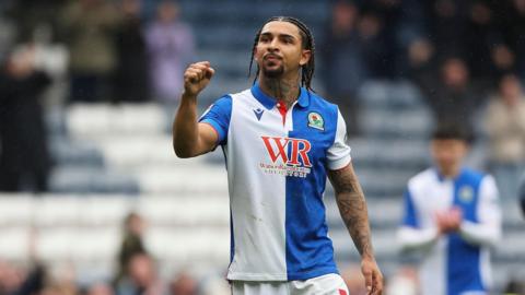 Tyrhys Dolan pumps his fist in celebration while playing for Blackburn