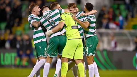 Shamrock Rovers players celebrate at the final whistle 