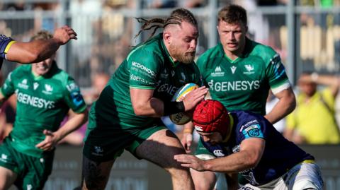 Connacht's Finlay Bealham is tackled during the first half at Stade Sergio Lanfranchi