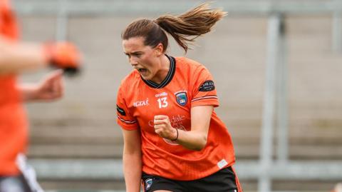 Aimee Mackin celebrates scoring a goal