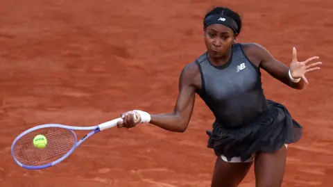 Coco Gauff hits a forehand
