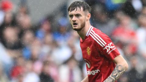 Joe Hugill in action for Manchester United