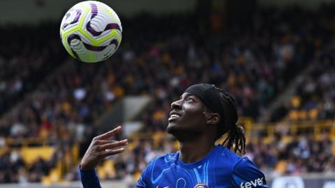 Chelsea's Noni Madueke celebrates his hat-trick against Wolves in the Premier League