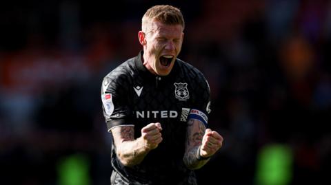 Wrexham wing-back James McClean celebrates