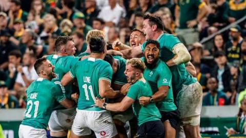 Ireland celebrate Frawley's drop-goal