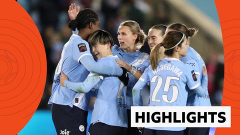 Manchester City Women celebrate a win with a group hug at the WSL on February 13 2026.