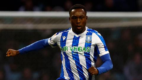 Sean Fusire running with the ball for Sheffield Wednesday.