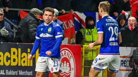 Adam Frizzell celebrates his equliser for Linfield