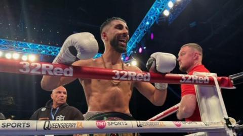 Shabaz Mamoud celebrates his points win over fellow Shropshire fighter Liam Davies in Birmingham   