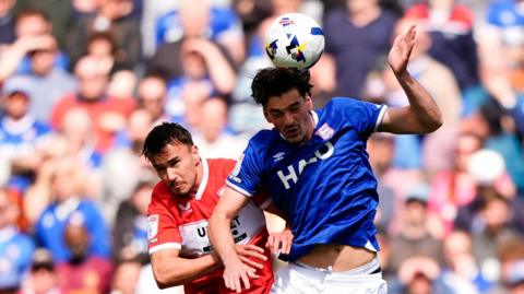 Ipswich Town's Jacob Greaves and Middlesbrough's David Strelec battle for the ball