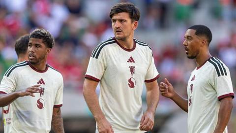 Manchester United players after loss to AC Milan