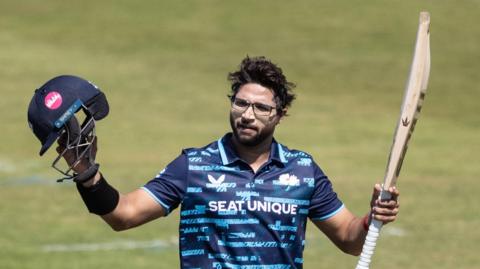 Imam-Ul-Haq of Yorkshire acknowledges the applause on reaching his century