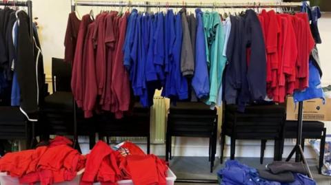 Generic image of school uniform on a clothes rack