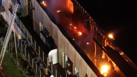 The top of a block of flats in flames in in Goring-by-Sea 