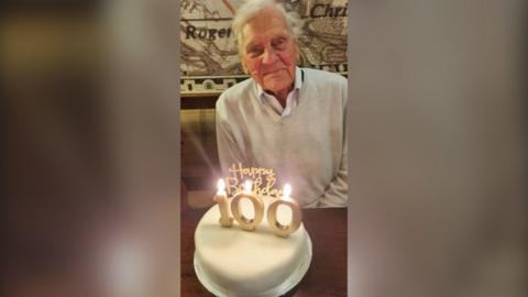 man with birthday cake 