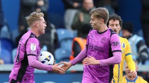 Wigan celebrate