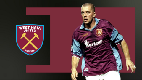 Julian Dicks playing for West Ham in front of a claret background and a West Ham crest