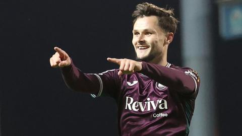 Liam Cullen celebrates