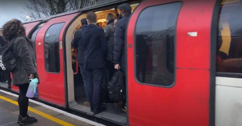 A packed Central line train