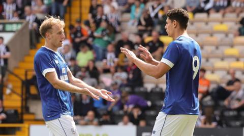 Eli King (left) celebrates with Cardiff City team-mate Yousef Salech
