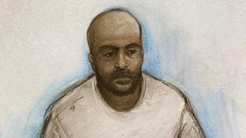 An artist's impression of Hadi Alodid, he has a bald head, black beard and wearing a grey sweatshirt