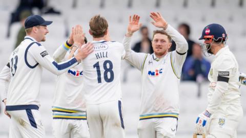 Dom Bess celebrates a wicket