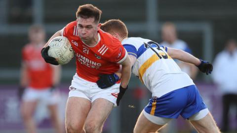 Clann Eireann's Dan McCarthy and Errigal Ciaran's Peter Harte fight for possession in Sunday's Ulster semi-final