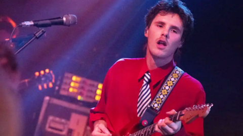 Cruz Beckham on stage