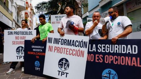 Protesters in Tenerife campaigning against the arrival of MV Hondius