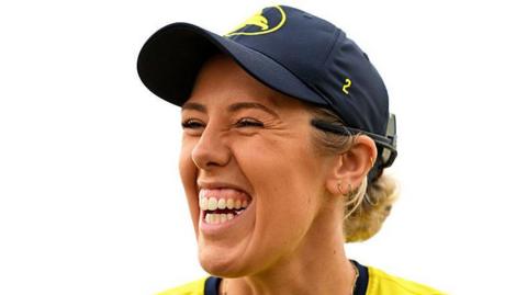 Georgia Adams smiling while playing for Hampshire