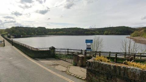 A Google Map screenshot of a reservoir with a concrete footpath running alongside it.