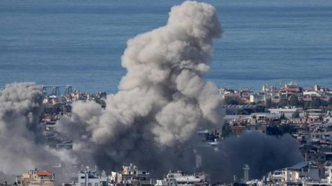 Smoke billows over the southern suburbs of Beirut after a reported Israeli air strike.