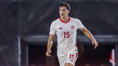 Alfie Jones in action for Canada