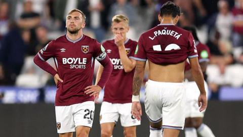 West Ham's Jarrod Bowen, James Ward-Prowse and Lucas Paqueta look dejected during the 5-1 home defeat by Chelsea