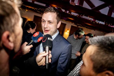 Chairman of Demokraatit, Jens-Frederik Nielsen talks to the media during the election party at Demokraatit by cafe Killut in Nuuk, March 11, 2025. The centre-right opposition Democrats have won a surprise victory in legislative elections in Greenland, the Danish territory coveted by US President Donald Trump, more than tripling their support to 29.9 percent of votes, official results showed Wednesday March 12.