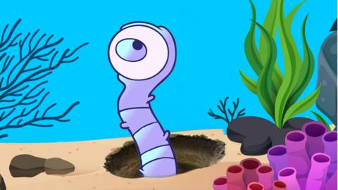 A illustrated purple worm with one eye emerging from a burrow on the sea floor. 