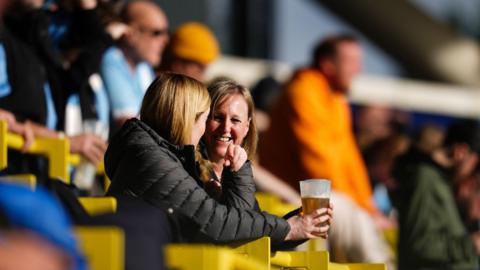 WSL fans with alcohol in the stands