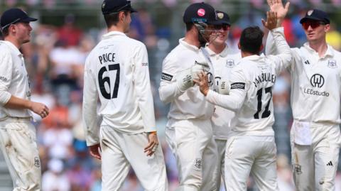 Gloucestershire celebrate wicket