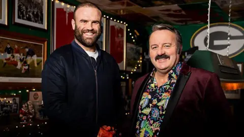 Jamie Roberts is welcomed by Mike Bubbins