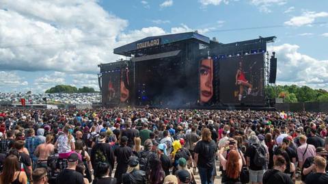 Huge crowds at the main stage of Download viewed from an elevated position
