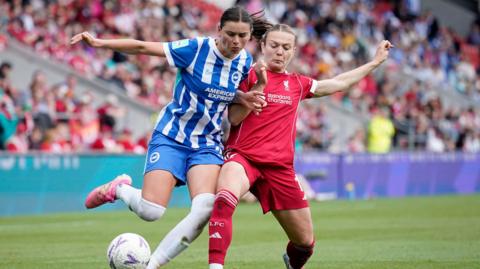 Charlize Rule and Beata Olsson tangle for the ball