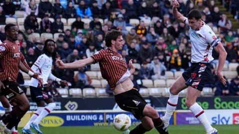 Bolton's Eoin Toal has a shot at goal