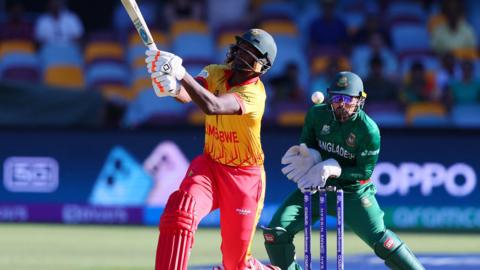 Zimbabwe's RIchard Ngarava hits out against Bangladesh at the 2022 T20 World Cup