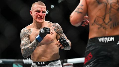 Mason Jones in action against Jeremy Stephens during UFC Fight Night at Wells Fargo Arena, Iowa